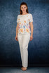 ...лятна блуза с акцент на флорална бродерия...в размери от 42 до 58