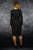 ...черна права рокля със раздвижени асиметрични елементи...в размери 42, 48